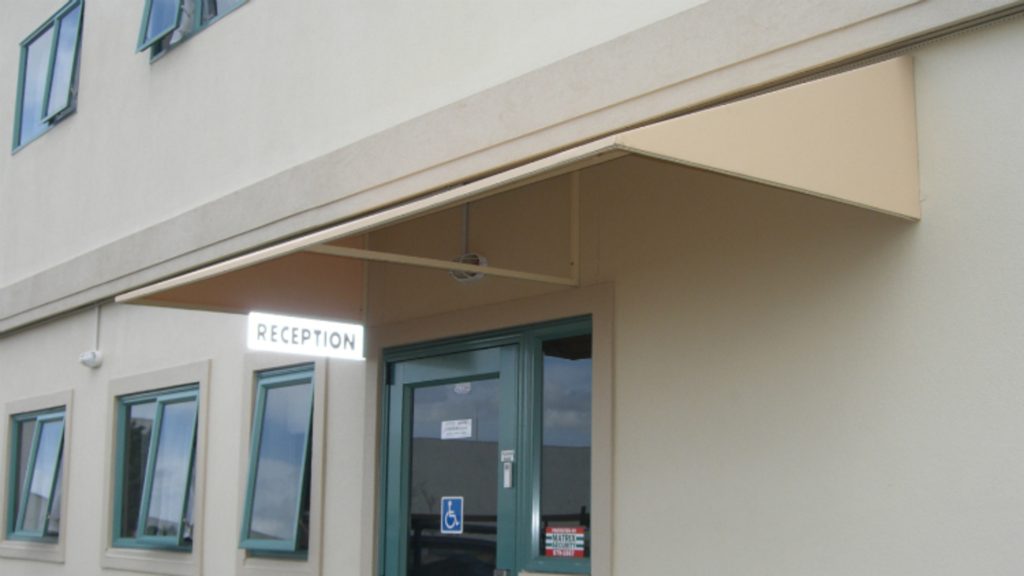 Fixed Message Panel Wedge Awning with Message Panel | Cool Awnings