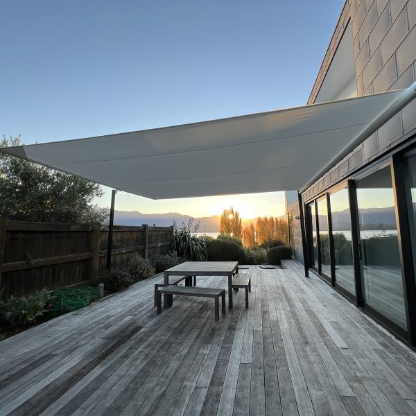 Retractable shade sail installed by Cool Awnings, providing flexible sun protection for outdoor areas.