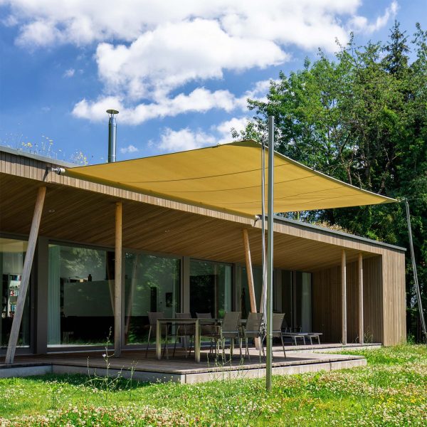 Retractable shade sail installed by Cool Awnings, providing flexible sun protection for outdoor areas.